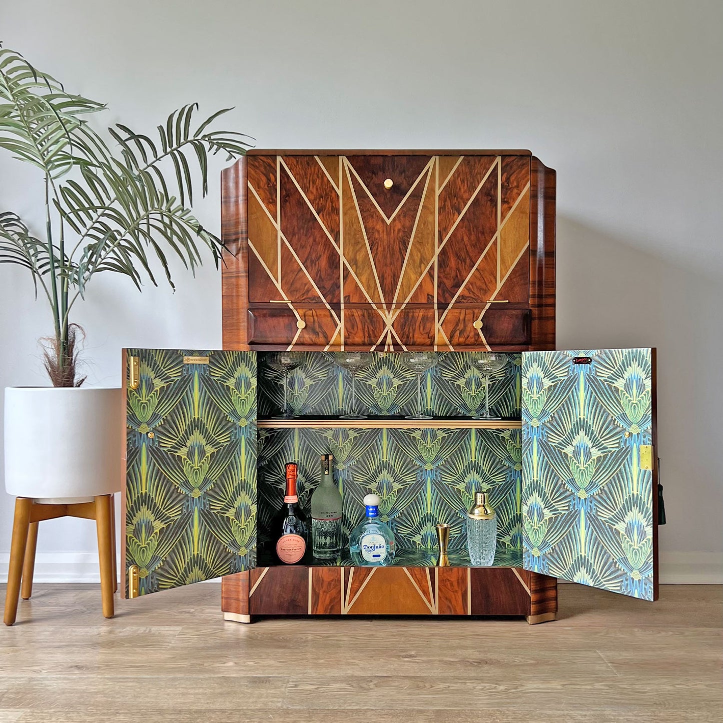 Open cabinet showcasing interior storage – Professionally restored Art Deco drinks cabinet featuring lockable bottom cupboard.